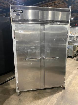 Continental 2RN stainless steel 2-door reach-in refrigerator with poly-coated wire racks, 115V, on casters, SN: 15914554.