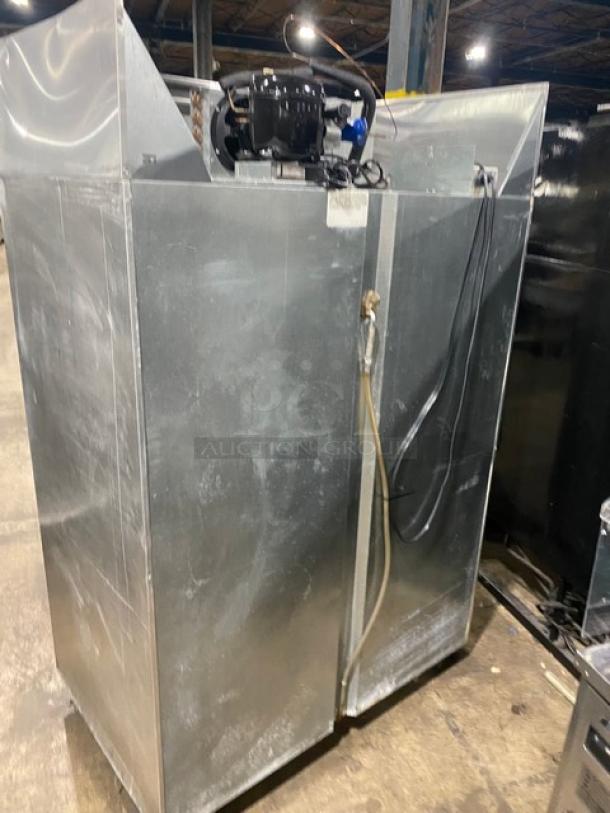 Continental Commercial Stainless Steel 2 Door Refrigerator, Model 2RN, on casters, with poly-coated wire racks.