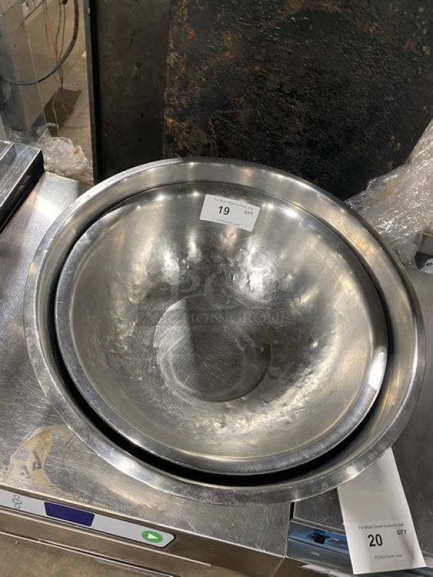 Commercial stainless steel mixing/prep bowl, durable construction, lightly used, includes auction tag indicating "19 QTY."