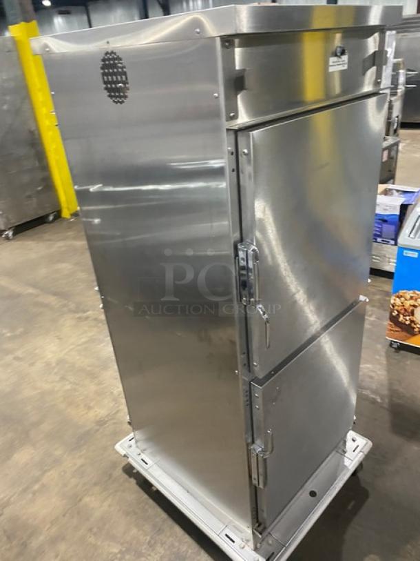 Winston Industries Cvap-4000A heated holding cabinet, model HA4522GE, stainless steel, half door, pass-through, on casters.