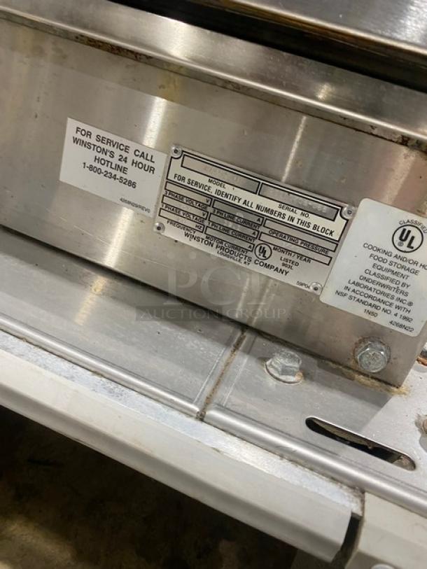 Winston Industries Cvap-4000A heated holding cabinet with pass-through doors, built-in pan slides, model HA4522GE, on casters.