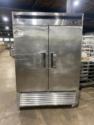 Atosa B-Series stainless steel 2-door reach-in refrigerator, model MBF8507, with poly coated wire racks, on casters.