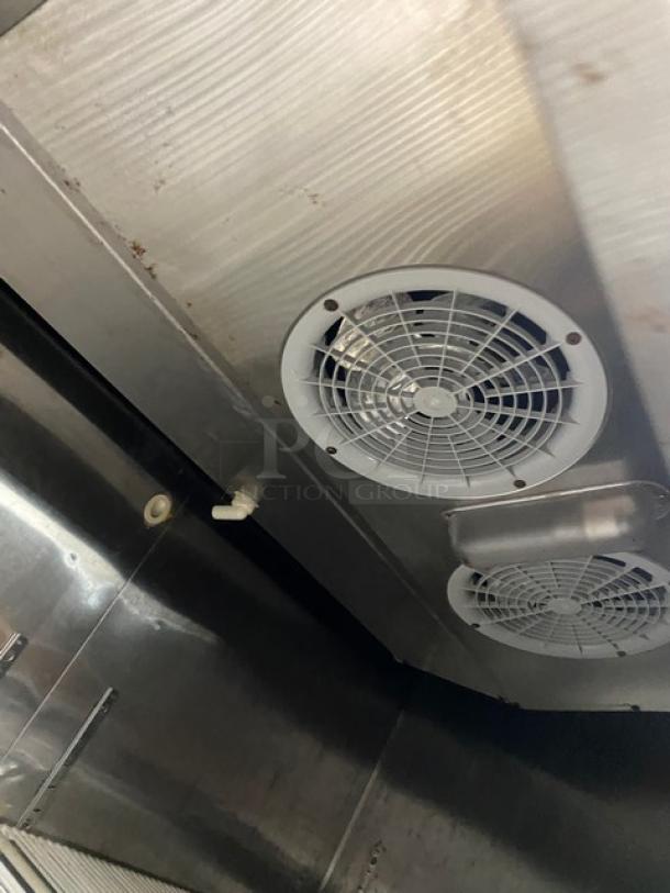 Atosa MBF8507 stainless steel refrigerator interior with fans, showing poly coated wire racks, on casters, model MBF8507.