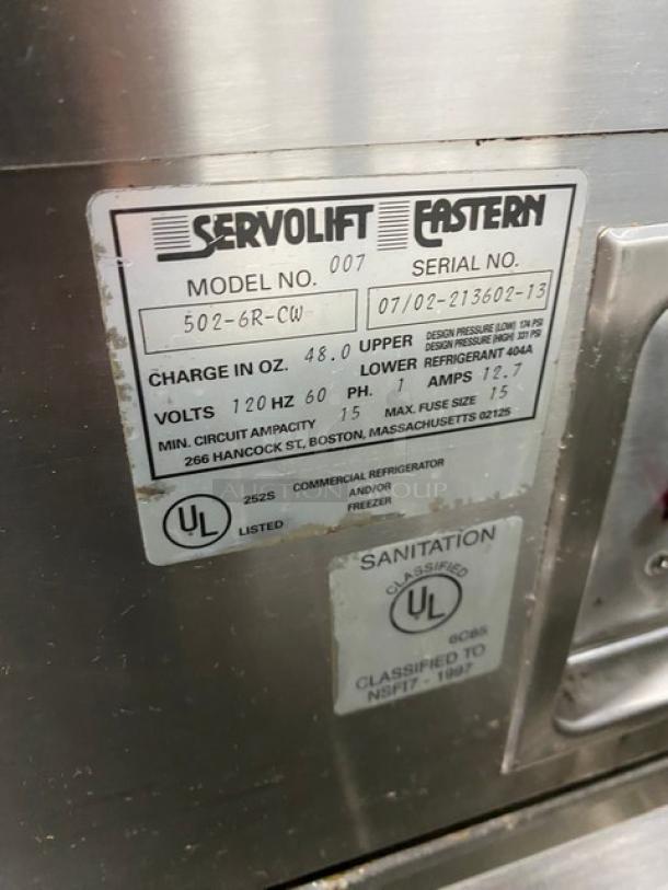 Servolift Model 502-6R-CW commercial stainless steel refrigerated salad bar with foldable tray slide, sneeze guard, and casters. UL listed.