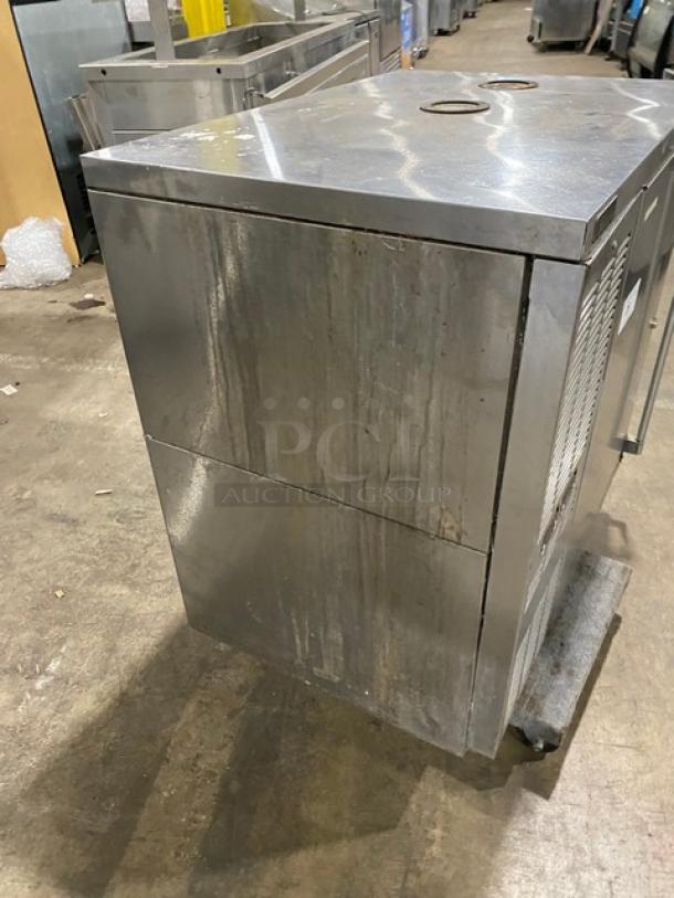 Perlick stainless steel dual-zone back bar storage cabinet, model DZS36-T-1. Visible wear on exterior, single section.