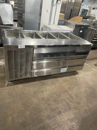 Delfield 4-drawer stainless steel refrigerated salad bar, model 18MC68PEF, with 5-bay top and enclosed undershelf, on casters.