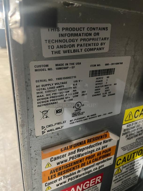 Delfield 18MC68PEF commercial stainless steel 4-drawer refrigerated salad bar, model and specs label visible.