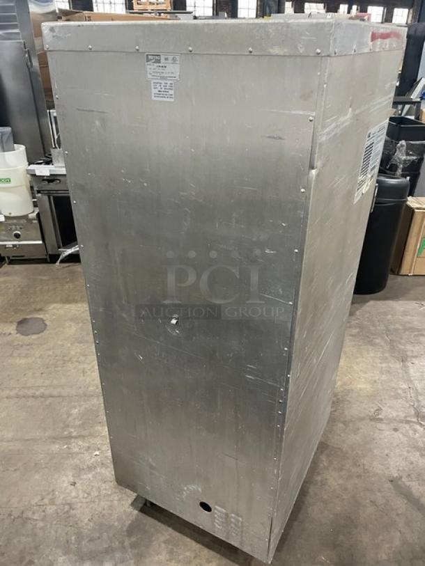 Metro Flavor Hold Series half-door mobile heated cabinet, model C199H1N, features wide pan slides, 120V, on casters, good condition.