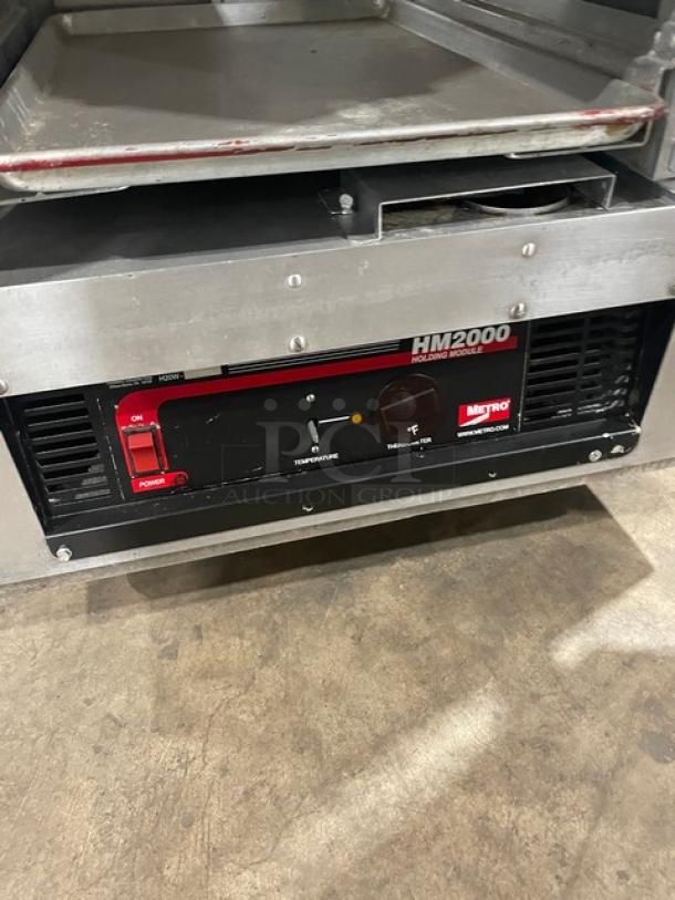 Metro Flavor Hold Series Heated Cabinet, Model C199-H(1)N, 120V, with wide pan slides and casters, features control panel.