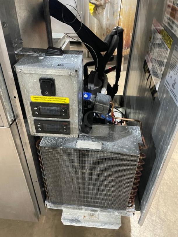 Delfield stainless steel refrigerated prep table, model 18SC39P-EF. Features: single door, triple storage, on casters, 115V.