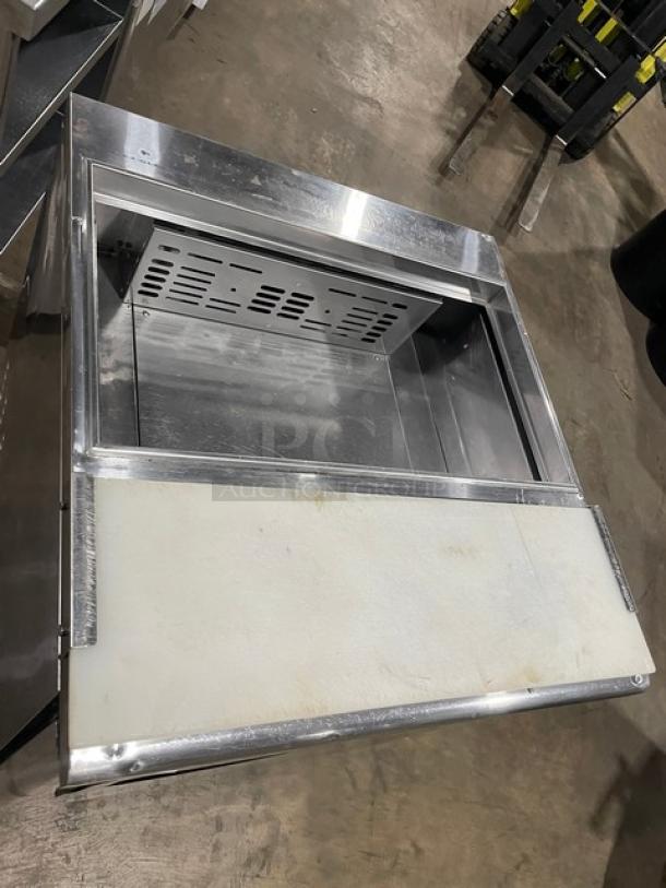 Turbo Air TST-28SD stainless steel refrigerated salad prep table with cutting board, on casters, 115V, commercial use.