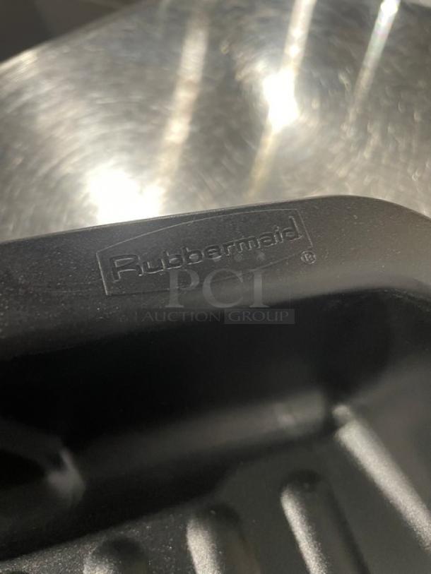 Rubbermaid Commercial black heavy-duty dustpan, model FG200500CHAR, brand new, 12.25" size. Rubbermaid logo visible.