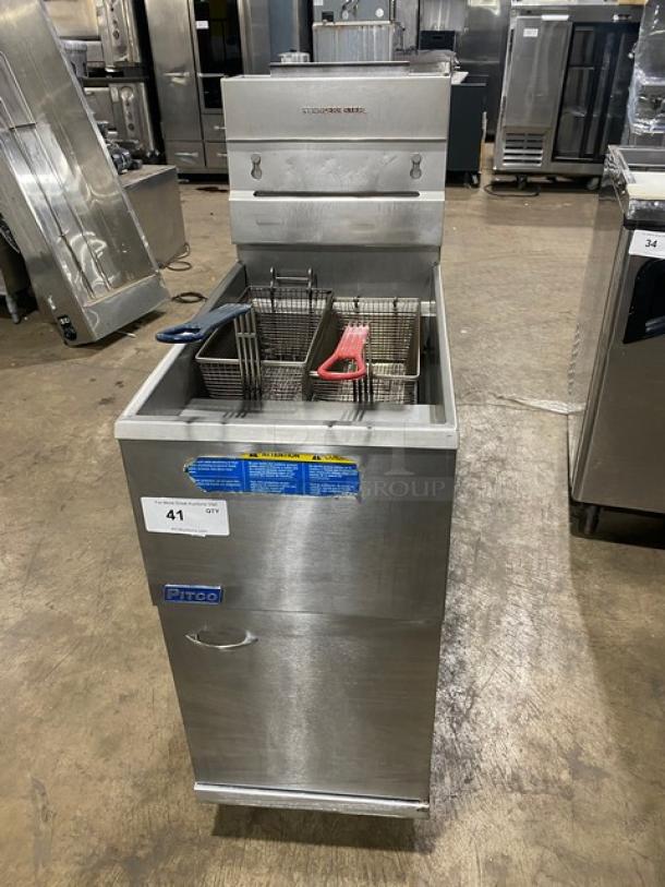Pitco commercial stainless steel 40 lb. deep fat fryer, natural gas powered, with backsplash, basket hanger, and fry baskets.