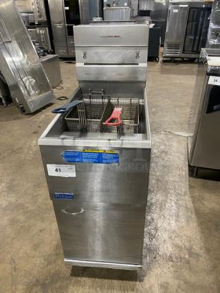 Pitco commercial stainless steel 40 lb. deep fat fryer, natural gas powered, with backsplash, basket hanger, and fry baskets.