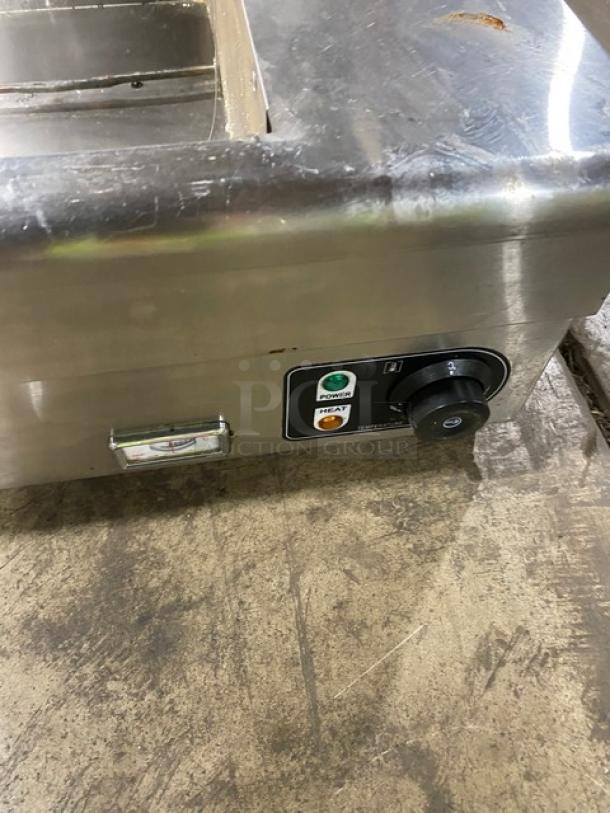 Vevor HTB210 stainless steel electric food warmer, countertop model with control knobs, SN: 20220523C-014, 110V, on legs.