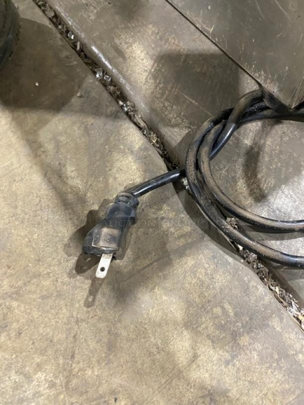 Power cord for Vevor HT-B210 stainless steel countertop food warmer, electric powered, indicating 110V capacity.