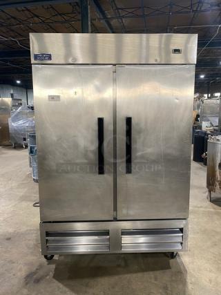 Arctic Air AR49EZ stainless steel 2-door reach-in refrigerator with poly-coated wire racks, on casters, Model: AR49EZ SN: H22116788.