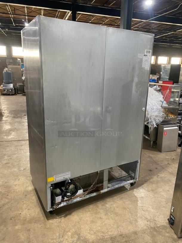 Arctic Air AR49EZ commercial stainless steel refrigerator, 2 solid doors, poly-coated wire racks, on casters, 115V.
