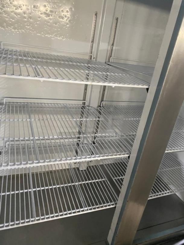 Arctic Air AR49EZ 2 Door Reach-In Refrigerator with poly-coated wire racks, stainless steel, on casters, 115V.