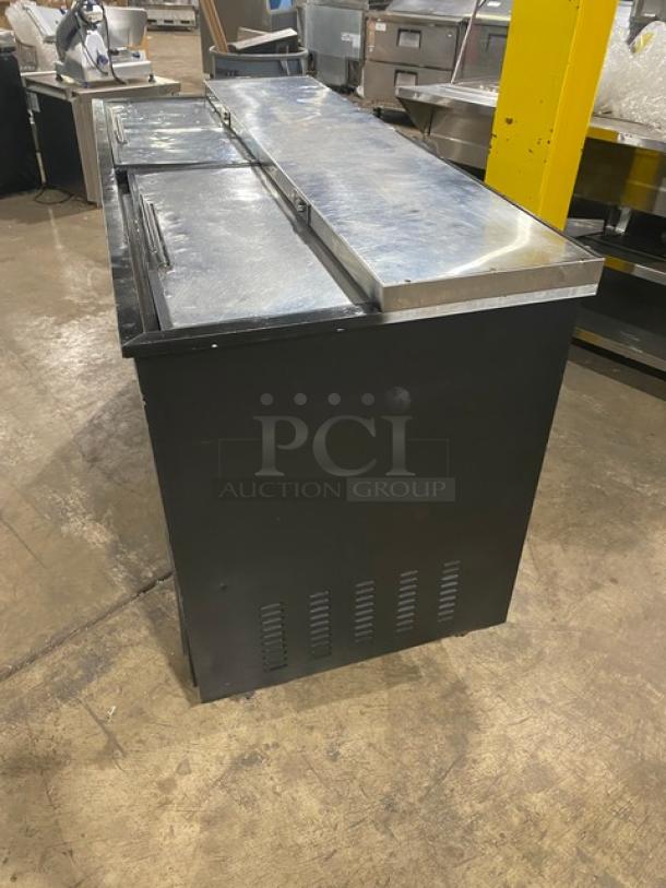 Maxx Cold X-Series black bottle cooler, model MXCR65B, stainless steel top, double sliding lids, excellent condition.