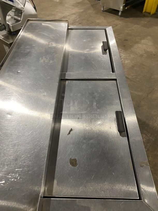 Fogel commercial black powder-coated double section back bar bottle cooler, model BC50DBST, stainless steel top, sliding lids, SN: 2003100019.