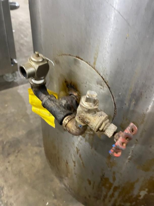 Groen AH140 stainless steel steam jacketed kettle, natural gas, 40 lb capacity, on legs, visible valves and pipes, used condition.