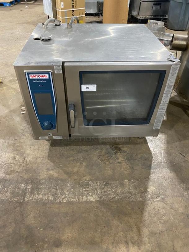 Rational SCCWE62G natural gas combi oven, stainless steel, 6-pan, full-size, Energy Star certified, with wired racks and hose.