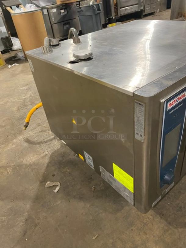 Rational SCCWE62G 6-pan combi oven, stainless steel, natural gas, Energy Star, wired racks, gas hose, on legs, model SN: G62S116092545598.