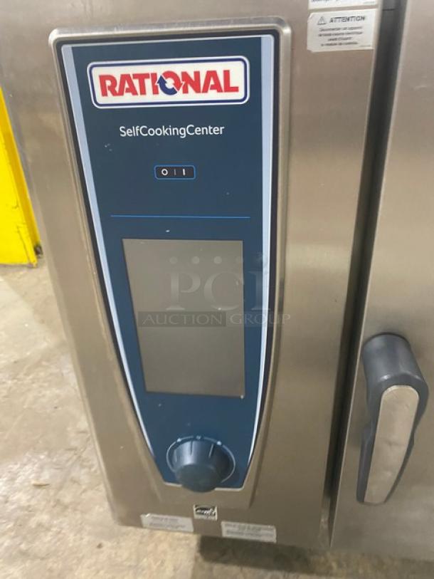 Rational SCCWE62G commercial combi oven, stainless steel, natural gas, 6-pan capacity, with gas connection hose.