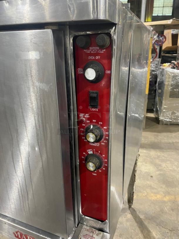 Blodgett stainless steel single stack convection oven, electric, with thermostatic controls, wired racks, on legs, used condition.