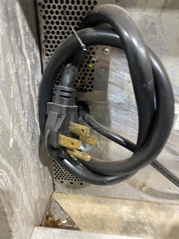 Blodgett commercial convection oven power cord with robust plug, emphasizing electric connectivity.