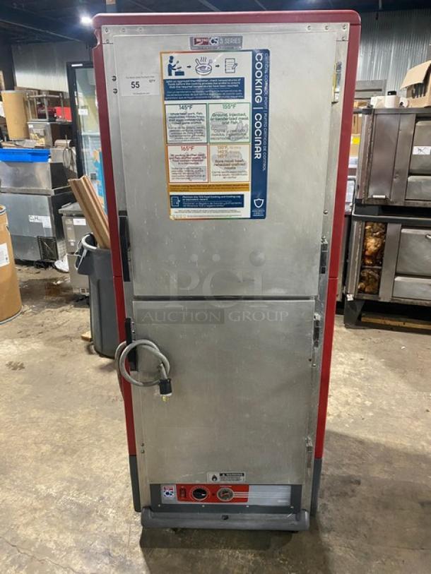Metro C5 3-Series heated cabinet, model C539HDD8890U, red half-door, insulated, on casters, visible cooking instructions.