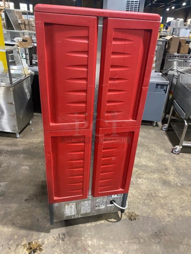 Metro C5 3-Series red half door warming cabinet, model C539HDD8890U, 120V, on casters, excellent condition.