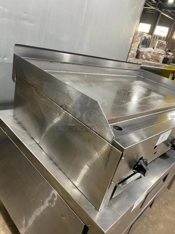 Connerton CG48M stainless steel countertop flat griddle, natural gas, with back and side splash, model CG-48M, SN 104027J21.