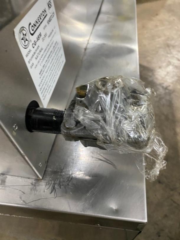 Connerton CG-48M stainless steel gas griddle; natural gas; with back and side splash; model tag visible; new condition.