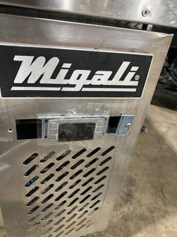 Migali commercial stainless steel 2-drawer refrigerated chef base on casters, visible Migali logo, vented front.