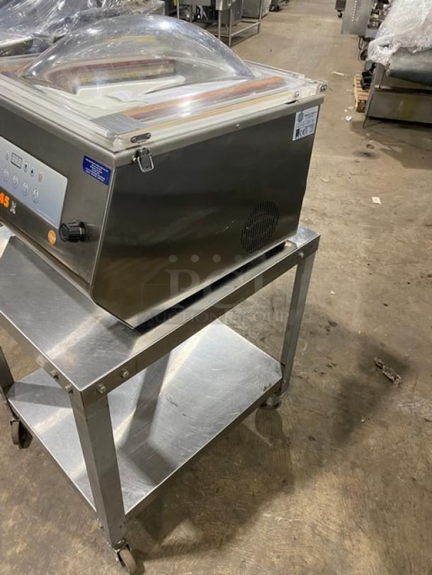 Minipack-Torre MVS45X commercial vacuum sealer on stainless steel cart with casters, featuring 120V electric operation.