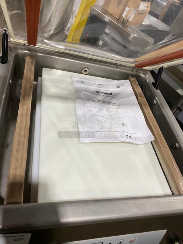 Minipack-Torre MV45X vacuum sealer on cart with casters. Includes manual, stainless steel, 120V, countertop model.