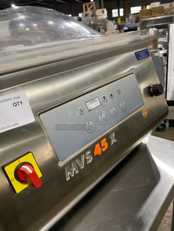 Minipack-Torre MV45X vacuum sealer in stainless steel; control panel visible. Includes equipment cart with undershelf, on casters.
