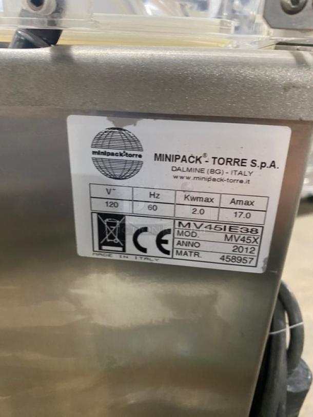 Minipack-Torre MVS45X stainless steel vacuum sealer, model MV45X, on casters. Features specs label showing 120V, 60Hz, 2.0 Kwmax.
