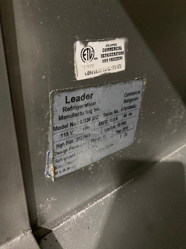 Leader LB36SC Refrigerated Worktop Lowboy, stainless steel, 2 doors, wired rack, 115V, 1 Phase, SN: PT010646a, on casters.