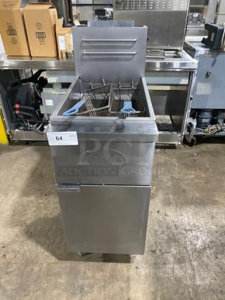 Globe stainless steel natural gas deep fryer with backsplash, basket hanger, and fry baskets. Excellent condition.
