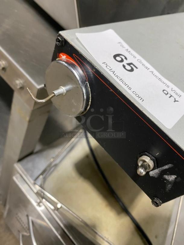 Hatco Glo-Ray Series stainless steel countertop food warmer with overhead heating strip, electric-powered. Tag shows auction info.
