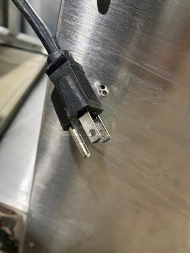 Hatco Glo-Ray stainless steel electric food warmer with plug, features overhead heating strip, portable, commercial use.