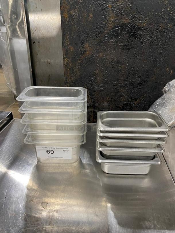Lot of commercial stainless steel steamtable pans and clear polycarbonate food pans, in good condition, auction lot 69.