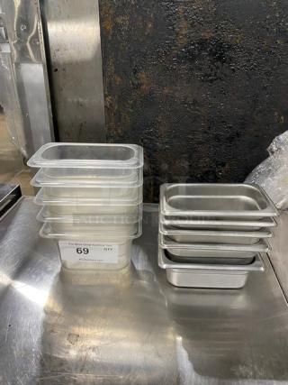 Lot of commercial stainless steel steamtable pans and clear polycarbonate food pans, in good condition, auction lot 69.