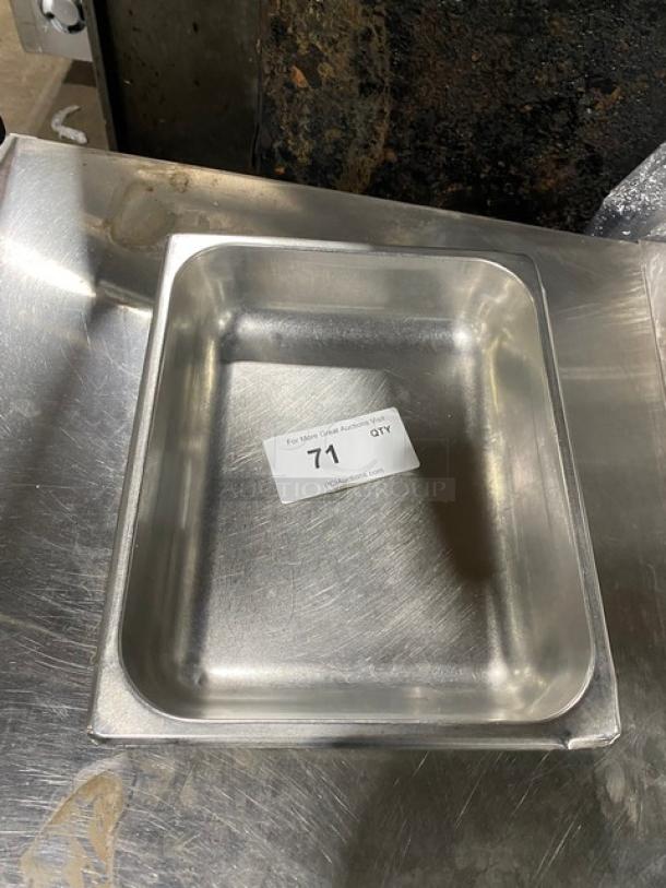 Commercial stainless steel hotel pan, gently used, with visible auction tag "71". Ideal for steam tables. Durable and versatile.