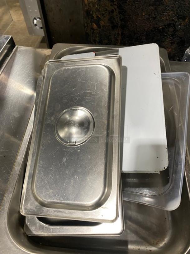 Lot of commercial stainless steel and polycarbonate steamtable pan lids, varying conditions, for hotel use.