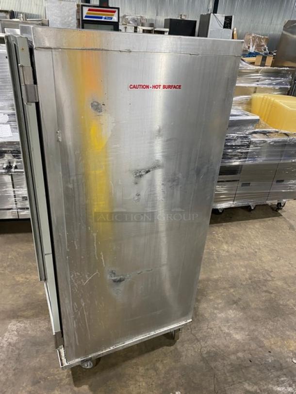 Serv-Ware SC1836HPI heated holding cabinet, stainless steel, on casters, "Caution: Hot Surface" label, used condition, 120V.
