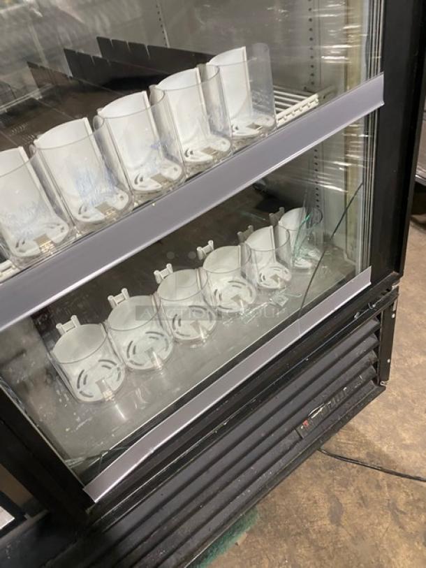 True GDM-49 commercial refrigerator, double glass doors, poly coated wire racks, beverage organizers, SN: 1-2816143, 115V 1 Phase.